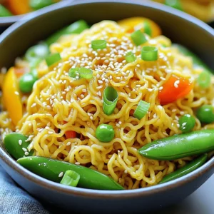 - 2 packs of instant ramen noodles - 3 tablespoons sesame oil - 4 cloves garlic, minced - 1 inch fresh ginger, grated - 3 tablespoons soy sauce - 1 tablespoon rice vinegar - 1 tablespoon brown sugar - 1/2 cup green onions, thinly sliced - 1/2 cup snap peas, trimmed - 1/2 cup bell peppers, julienned - Sesame seeds for garnish - Optional: Sriracha for heat These ingredients come together to create a flavorful dish. The instant ramen noodles are quick and easy, making this meal perfect for busy days. The sesame oil adds a rich, nutty taste, while the garlic and ginger bring a warm, aromatic touch. The soy sauce, rice vinegar, and brown sugar blend well, creating a savory sauce that coats the noodles perfectly. Fresh vegetables like snap peas and bell peppers add a nice crunch and vibrant colors. Top it all off with green onions and sesame seeds for a beautiful finish. If you like a bit of spice, add Sriracha to kick up the heat. This dish not only tastes great, but it also looks stunning when served. It's simple to make and packed with flavor. Get ready to impress your taste buds! Start by bringing a pot of water to a boil. Once the water bubbles, add the instant ramen noodles. Cook them according to the package instructions. This usually takes about 3-4 minutes. You want the noodles to be al dente, so keep an eye on them. After they are cooked, drain the noodles and set them aside. For the sauce, gather these ingredients: - 3 tablespoons soy sauce - 1 tablespoon rice vinegar - 1 tablespoon brown sugar In a small bowl, whisk these ingredients together. Mix until the brown sugar is fully dissolved. This sauce adds a nice balance of salty and sweet. Next, heat 3 tablespoons of sesame oil in a large skillet or wok over medium heat. Once the oil is hot, add 4 cloves of minced garlic and 1 inch of grated ginger. Sauté these for about 1 minute. You want them fragrant, not browned. This step builds great flavor in your dish. Add 1/2 cup of trimmed snap peas and 1/2 cup of julienned bell peppers to the skillet. Stir-fry these veggies for about 2-3 minutes. You want them tender but still crisp. This adds color and crunch to your noodles. Now it’s time to combine everything. Add the drained ramen noodles to the skillet with the vegetables. Pour the prepared sauce over the noodles. Toss everything together gently. Make sure the noodles and veggies are evenly coated with the sauce. Cook for another 2-3 minutes until everything is heated through. To finish, stir in 1/2 cup of thinly sliced green onions. Toss once more to mix. If you like heat, add a drizzle of Sriracha to taste. This adds a spicy kick that brings the dish to life. Serve the noodles in bowls and sprinkle with sesame seeds for garnish. Enjoy your delicious sesame garlic ramen noodles! To get perfect ramen noodles, cook them al dente. This means they should be firm but not hard. Follow the package time closely. Drain the noodles right away to prevent them from cooking more. When sautéing garlic and ginger, heat the sesame oil over medium heat. Add the garlic and ginger, and stir quickly. Cook them for about a minute. You want them fragrant, not brown. Burnt garlic can make your dish taste bitter. Garnishing your noodles with sesame seeds adds a nice touch. Sprinkle them on top just before serving. The seeds give a great crunch and flavor. For extra flavor, drizzle sesame oil over the finished dish. This adds richness and a glossy look to your noodles. It makes a big difference in taste and presentation. Want more heat? Adjust the spice level by adding Sriracha. Start with a little, then add more to taste. It’s easy to make the dish just right for you. You can also swap vegetables based on your taste. Try using broccoli, carrots, or even mushrooms. This makes the dish unique and suits your preferences. {{image_2}} To make this dish vegetarian, you can add tofu or mushrooms. Tofu adds protein and absorbs flavors well. Press and cube firm tofu, then sauté it until crispy. You can also use shiitake or button mushrooms. Slice them and cook until tender. Both options enrich the dish and keep it satisfying. For extra protein, consider adding chicken, shrimp, or beef. If using chicken, slice it thin and cook it in the skillet first. Shrimp cooks quickly; add it after the garlic and ginger. For beef, use thin strips and stir-fry until browned. Each protein adds a unique flavor and makes the dish heartier. If you need a gluten-free option, use gluten-free ramen noodles. These noodles come in various types, such as rice or buckwheat. Always check the package for cooking instructions. They work well with the same sauce and ingredients, ensuring everyone can enjoy this tasty meal. To store your leftover sesame garlic ramen noodles, use an airtight container. This helps keep the noodles fresh for longer. Make sure to let the noodles cool before sealing. It’s best to eat them within three days for the best taste. For keeping the noodles, avoid having the sauce sit on top. Instead, store the noodles and sauce separately if possible. This keeps the noodles from getting too soggy. You can reheat your noodles in two ways: microwave or stovetop. If you use the microwave, place the noodles in a safe bowl. Add a splash of water to keep them moist. Heat in short bursts of 30 seconds, stirring in between. For stovetop reheating, use a pan over low heat. Add a bit of sesame oil to prevent sticking. Stir gently until the noodles are warm. This method keeps the texture nice and chewy. Remember, reheating is not just about warming up food. It’s about keeping that delicious flavor and texture too! You cook instant ramen noodles for about 3-4 minutes. Bring a pot of water to a boil. Add the noodles and stir. Check for doneness, then drain and set them aside. Yes, you can make this dish vegetarian. Simply skip the meat and add more veggies. You can use tofu for protein. It adds texture and flavor. Yes, you can prep this dish in advance. Cook the noodles and veggies, then store them separately. Keep them in airtight containers in the fridge. Reheat them when you are ready to eat. If you don't have sesame oil, try using olive oil or avocado oil. Both provide a nice flavor. You can also use peanut oil for a different twist. To add spice, you can use Sriracha. Drizzle it on top before serving. You can also add red pepper flakes or fresh chili peppers during cooking for extra heat. Yes, fresh ramen works well too. You typically cook fresh ramen for 2-3 minutes. Be sure to check the package for exact cooking times. Fresh noodles have a nice texture and flavor. This blog post shared a simple recipe for Sesame Garlic Ramen Noodles. You learned the key ingredients and easy steps to prepare a tasty dish. I highlighted useful tips for cooking and personalizing the recipe. You can adjust flavors and even add different proteins or vegetables. In conclusion, this dish is quick, fun, and perfect for any meal. Enjoy trying it out with your favorite twists!