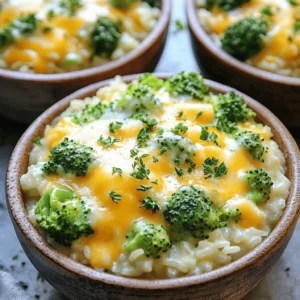 - 2 cups broccoli florets (fresh or frozen) - 1 cup long-grain white rice - 3 cups vegetable broth The main stars of this dish are the broccoli, rice, and vegetable broth. Broccoli adds a nice crunch and color. You can use fresh or frozen, so it's easy to find. Long-grain white rice cooks well in the slow cooker and absorbs all the flavors. The vegetable broth gives a rich taste to the rice and broccoli. - 1 cup shredded cheddar cheese - 1/2 cup cream cheese, softened - 1/2 cup grated Parmesan cheese Cheese is key for this casserole. Cheddar cheese gives it a sharp flavor and melts nicely. Cream cheese makes the dish creamy and rich. Parmesan cheese adds a salty kick. Together, they create a cheesy goodness that makes this casserole irresistible. - 1 small onion, finely chopped - 2 cloves garlic, minced - 1 teaspoon garlic powder - 1 teaspoon onion powder - 1/2 teaspoon black pepper - Salt to taste Flavor is all about the details. Onions and garlic bring depth to every bite. Fresh garlic and garlic powder work together to boost that garlic flavor. Black pepper and salt enhance the taste and balance the dish. These little ingredients make a big difference in flavor. 1. Start by mixing the rice and broth. In a medium bowl, combine 1 cup of long-grain white rice with 3 cups of vegetable broth. Stir until well mixed. This step adds flavor to the rice as it cooks. 2. Next, layer the broccoli in the slow cooker. Place 2 cups of broccoli florets evenly at the bottom of the slow cooker. This creates a nice base for your casserole. 1. Now, prepare the cream cheese mix. In a separate bowl, mix 1/2 cup of softened cream cheese, 2 cloves of minced garlic, 1 small finely chopped onion, 1 teaspoon of garlic powder, 1 teaspoon of onion powder, 1/2 teaspoon of black pepper, and salt to taste. Blend until smooth. This creamy mix is key for flavor. 2. Spoon this mixture over the rice and broccoli layer in the slow cooker. Spread it out gently to cover everything. This helps create an even taste throughout the dish. 1. Cover the slow cooker and set it to low heat. Cook for 3 to 4 hours. Check the rice to ensure it is fully cooked and the liquid is absorbed. 2. Once cooked, add in 1 cup of shredded cheddar cheese and 1/2 cup of grated Parmesan cheese. Stir well to combine. This step makes the casserole cheesy and delicious. 3. Cover the slow cooker again for 10 to 15 minutes. This allows the cheese to melt and become ooey-gooey. 4. Finally, stir gently and taste for seasoning. Adjust with more salt or pepper if needed. Enjoy your warm, cheesy casserole! To ensure your rice is fully cooked, check it after 3 hours. The rice should be soft and fluffy. If you use brown rice, add an extra cup of broth and cook for 4 to 5 hours. This helps the rice absorb enough liquid. If you choose a different rice type, adjust the liquid. For basmati rice, use 2.5 cups of broth. For jasmine rice, stick with the original 3 cups. Each rice type has a unique water need, so this step is key! To boost flavor, add fresh herbs. Chopped parsley or thyme can brighten the dish. You can also sprinkle in some paprika for a warm taste. For a twist, try using smoked cheese instead of cheddar. This adds a rich depth. If you want a creamy alternative, swap out regular cheese for goat cheese. It adds a tangy note that pairs well with broccoli. Each option can change the casserole&rsquo;s flavor and feel. Garnish your casserole with chopped fresh parsley. This adds color and freshness. You can also sprinkle some extra cheese on top right before serving for a gooey finish. Serve in large bowls for a cozy feel. For a fun twist, layer the casserole in small jars. This makes for a cute presentation at parties. You can even add a sprig of parsley on top for a pop of color! {{image_2}} You can make this dish even better by swapping some ingredients. Try using different cheeses. Gouda or mozzarella can add a nice twist. You can mix things up with vegetables too. Add bell peppers, carrots, or peas for extra color and taste. If you want a vegan version, use dairy-free cream cheese and cheese substitutes. There are many great vegan cheese options available now. Also, for gluten-free needs, make sure your broth is gluten-free. Use gluten-free rice if that&rsquo;s your choice. Want to add a protein? Chicken, sausage, or even tofu works well. Just cook it first before adding it to the slow cooker. For a spicy kick, drizzle some hot sauce or add jalape&ntilde;os. These changes can make your casserole exciting and new! To keep your Slow Cooker Cheesy Broccoli Rice Casserole fresh, follow these steps: - Refrigeration tips: Place leftovers in an airtight container. Store in the fridge for up to four days. - Freezing options for long-term storage: For longer storage, freeze in a freezer-safe container. It can last for up to three months. Make sure to label the container with the date. Reheating your casserole is simple. Here are the best methods: - Best methods for reheating: Microwave individual portions on medium heat. Stir every minute until hot. Alternatively, reheat in the oven at 350&deg;F (175&deg;C) for 20-30 minutes. - Maintaining texture and flavor after storage: To keep the creamy texture, add a splash of broth or milk when reheating. This helps restore moisture. Knowing how long your casserole lasts is key. Here&rsquo;s what to expect: - Expected duration in the refrigerator: In the fridge, expect your casserole to last about four days. - Signs of spoilage to watch for: Look for off smells, mold, or changes in texture. If any signs appear, throw it away to stay safe. Yes, you can use brown rice. Brown rice takes longer to cook. You should increase the cooking time to about 5-6 hours on low heat. Also, add an extra cup of vegetable broth to help it cook through. You have many options here. You can use homemade broth made from veggies. You can also use water with a bit of added salt. Store-bought options include chicken broth or mushroom broth. Each will give a different flavor, so choose what you like best. You can tell it's done when the rice is tender and the liquid is absorbed. The casserole should look creamy and not soupy. To test the rice, take a spoonful and taste it. If it&rsquo;s soft and cooked, you&rsquo;re good to go! We covered a simple and tasty slow cooker broccoli cheese casserole. You learned about the main and dairy ingredients, plus all the flavorings. I shared easy cooking steps and key tips to boost taste and avoid mishaps. With fun variations, you can tailor the recipe to suit your needs. Lastly, I included storage tips to keep your leftovers fresh. Remember, this dish is all about creativity and comfort. Enjoy making your casserole, and let it bring smiles to your table!