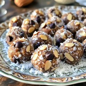 - 1 cup rolled oats - 1/2 cup unsweetened shredded coconut - 1/2 cup almond butter - 1/4 cup honey or maple syrup - 1/2 cup dark chocolate chips - 1/4 cup chopped almonds - 1 teaspoon vanilla extract - A pinch of sea salt To make No-Bake Almond Joy Energy Bites, you need simple and tasty ingredients. Rolled oats form the base, giving these bites a chewy texture. Unsweetened shredded coconut adds sweetness and a tropical feel. Almond butter brings creaminess and healthy fats. Honey or maple syrup acts as a natural sweetener and binds everything together. Dark chocolate chips provide a rich flavor that pairs perfectly with the other ingredients. Chopped almonds add crunch and nutty goodness. A dash of vanilla extract enhances the taste, while a pinch of sea salt balances the sweetness. - Additional nuts - Nut butter alternatives - Flavored extracts You can customize your energy bites with optional add-ins. Try using different nuts like walnuts or pecans for added texture. If you want a nut-free option, use sunflower seed butter instead of almond butter. Flavored extracts like almond or coconut can give a nice twist to the flavor profile. - Mixing bowls - Baking sheet - Parchment paper Having the right tools makes the process easy. Use mixing bowls to combine your ingredients. A baking sheet helps organize the energy bites as you roll them. Parchment paper is key for easy cleanup and prevents sticking. Gather up these items before you start, and you&rsquo;ll be ready to whip up a batch of these delightful snacks! First, I combine the dry ingredients. In a large bowl, I mix 1 cup of rolled oats with 1/2 cup of unsweetened shredded coconut. I stir them until they blend well. Next, I add the wet ingredients. I put in 1/2 cup of almond butter and 1/4 cup of honey or maple syrup. I also add 1 teaspoon of vanilla extract and a pinch of sea salt. I mix everything thoroughly. This step ensures the dry ingredients get coated well. Now comes the fun part&mdash;rolling the mixture into balls! I use my hands to scoop small portions. Each ball is about 1 inch wide. I make sure to roll them tightly so they hold their shape. Once I have rolled all the mixture, I place the energy bites on a baking sheet lined with parchment paper. This keeps them from sticking. It's time to chill and let them set. I transfer the baking sheet to the fridge. I let the bites chill for at least 30 minutes. This helps them firm up nicely. For serving, I like to present them in a decorative jar or on a platter. I add a touch of extra shredded coconut and whole almonds on top for a beautiful display. This makes them look as good as they taste! To make these energy bites perfect, focus on mixing. Use a large bowl to combine the dry ingredients first. This helps mix the oats and coconut evenly. When you add the almond butter and sweetener, mix well. This step is key for good flavor. Don't rush! You want every piece coated. Next, check the consistency. The mixture should be sticky but firm. If it's too dry, add a little more almond butter. If it's too wet, add a bit more oats. The right mix makes it easy to roll into balls. These energy bites shine on their own, but you can jazz them up. Pair them with fresh fruit or yogurt for a fun snack. They also work great on a platter with nuts and dried fruits. For a beautiful presentation, use a decorative jar. You can also sprinkle extra coconut or place whole almonds on top. A nice touch makes snacks more appealing! You can switch things up with sweeteners. If you want less sugar, use stevia or agave syrup. These alternatives still taste great! Don't stop at almonds. Try different nuts like walnuts or pecans. Each nut gives a new flavor and texture. This keeps your energy bites fresh and exciting! {{image_2}} You can change up the flavors of your energy bites. Try coconut chocolate chip twists. Just add a bit more coconut and some extra chocolate chips. This gives a sweet, chewy treat. Another fun choice is s'mores-style energy bites. Add mini marshmallows and graham cracker crumbs for a campfire taste without the fire. If you need gluten-free options, use gluten-free oats. They work just as well as regular oats. For a vegan version, swap honey for maple syrup. This makes the bites plant-based and just as tasty. You can enjoy them without any animal products. Seasonal flavors can make your bites special. For fall, pumpkin spice energy bites are a hit. Just add pumpkin puree and pumpkin pie spice. They taste like autumn in every bite! For the holidays, make holiday-themed varieties. You can use peppermint extract or festive sprinkles to celebrate the season. To keep your No-Bake Almond Joy Energy Bites fresh, use an airtight container. This helps prevent air and moisture from making them soggy. I recommend glass or plastic containers with tight lids. Store them in a cool, dark place, like the fridge. This keeps the bites firm and tasty longer. You can freeze these energy bites for up to three months. First, place them in a single layer on a baking sheet. Freeze them for about an hour. Afterward, transfer the bites to a freezer-safe bag or container. Make sure to label the bag with the date. When you're ready to eat, thaw them in the fridge overnight. This will keep them soft and ready to enjoy. In the fridge, your energy bites last about one week. To tell if they're spoiled, check for a strange smell or a change in color. If they look dry or hard, it&rsquo;s best to toss them. Always trust your senses! No-Bake Almond Joy Energy Bites stay fresh for up to one week in the fridge. Store them in an airtight container. This will keep them moist and tasty. If you notice any change in smell or texture, it's best to discard them. Yes, you can make these energy bites ahead of time. They are perfect for meal prep. You can prepare a batch and store them in the fridge for quick snacks. Just roll them into balls, chill, and then grab them when you need a bite. No-Bake Almond Joy Energy Bites offer some great health benefits. They have rolled oats, which provide fiber and energy. Almond butter adds healthy fats and protein, while dark chocolate chips add antioxidants. Be mindful of portion sizes, as they are still high in calories. These No-Bake Almond Joy Energy Bites are easy and fun to make. You need simple ingredients like oats, almonds, and chocolate chips. I shared tips for flavor and storage, too. You can customize with add-ins and variations. In the end, these bites are tasty, healthy snacks. They fit into any diet and are great for meal prep or on-the-go energy. Enjoy creating and sharing these energy bites with friends and family!