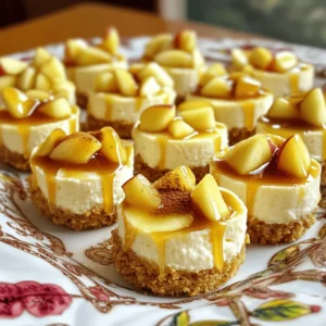 To make caramel apple cheesecake bites, gather these items: - 1 cup graham cracker crumbs - 1/4 cup granulated sugar - 1/2 cup unsalted butter, melted - 8 oz cream cheese, softened - 1/2 cup powdered sugar - 1 teaspoon vanilla extract - 1 small apple, peeled, cored, and finely diced - 1/2 teaspoon cinnamon - 1/4 cup caramel sauce (plus extra for drizzling) - Pinch of salt You can swap some ingredients if needed: - Use gingersnap crumbs instead of graham cracker crumbs for a spicier flavor. - Coconut oil can replace unsalted butter for a dairy-free option. - For a lighter cream cheese, try Neufch&acirc;tel cheese. - You can use brown sugar instead of granulated sugar for a deeper taste. For the best results, measure carefully: - Use a dry measuring cup for the graham cracker crumbs and sugar. - Pack the crumbs lightly but firmly to avoid air pockets. - Use a liquid measuring cup for melted butter. - When measuring powdered sugar, spoon it into the cup and level it off with a knife for accuracy. Start by gathering your ingredients for the crust. You need graham cracker crumbs, granulated sugar, and melted butter. Mix these in a medium bowl. Combine until the crumbs look like wet sand. This part is key because it holds everything together. Now, take mini muffin tins. Press about a tablespoon of this mixture into each cup. Use the back of a spoon to pack it down firmly. Make sure it is even and solid. This will form a nice base for your dessert. Next, you will create the cheesecake filling. Take softened cream cheese and put it in a bowl. Beat it until smooth and creamy. It should be free of lumps. Gradually add powdered sugar, vanilla extract, and a pinch of salt. Mix until everything is well combined. Now, chop your small apple into tiny pieces. Sprinkle in the cinnamon, then fold the apple and cinnamon into the cream cheese mixture. Make sure the apple is spread out evenly. This step adds flavor and texture to your bites. Now, it's time to assemble your cheesecake bites. Spoon the cheesecake mixture into the muffin tins over the crusts. Fill each cup to the top. This ensures each bite has a good amount of creaminess. After filling, place the muffin tin in the fridge. Let the bites chill for at least two hours. This helps them set and become firm. Once they are chilled, remove them carefully from the muffin tin. Drizzle caramel sauce on top of each bite for extra sweetness. You can also add thin apple slices for a nice touch. Enjoy your delicious caramel apple cheesecake bites! When making caramel apple cheesecake bites, avoid overmixing the filling. Overmixing can make the cheesecake too fluffy. Be gentle when folding in the diced apples. If you chop them too large, they won&rsquo;t blend well. Also, don&rsquo;t skip chilling time. If you remove them too soon, they may fall apart. For a smooth filling, make sure your cream cheese is very soft. It should be at room temperature. This helps it mix well with the sugar and other ingredients. A pinch of salt enhances the flavors and balances the sweetness. The right amount of caramel sauce adds a creamy richness without making it too runny. Serve these bites chilled for the best taste. Drizzle extra caramel sauce on top for a sweet finish. Add thin apple slices around the bites for a pretty presentation. Sprinkle a little cinnamon on top for a warm touch. This adds color and a lovely aroma, making them even more inviting. {{image_2}} You can make your caramel apple cheesecake bites even better. Add spices like nutmeg or ginger for warmth. These spices blend well with the apple and caramel. You can also try different extracts. Almond or maple extract gives a unique touch. Just one teaspoon will change the flavor. Experiment and find your favorite mix. Want a lighter treat? Use sugar substitutes like stevia or erythritol. These sweeteners make the bites lower in calories. You can also swap the cream cheese for Greek yogurt. This change adds protein and cuts fat. Look for low-fat or fat-free options for the crust too. Use whole wheat crumbs instead of regular graham crackers. These swaps keep the taste while being healthier. Change up the fruit for seasonal fun. In fall, use pears or cranberries instead of apples. These fruits offer a new taste and texture. In summer, fresh berries like blueberries or strawberries work great. They add a burst of color too. Each season brings unique flavors, so have fun trying different fruits. The options are endless! To keep your caramel apple cheesecake bites fresh, store them in an airtight container. Place parchment paper between layers if you stack them. This prevents sticking and keeps them neat. Keep the container in the fridge. These bites taste best when chilled. You can freeze these bites if you want to store them longer. First, let them cool completely. Then, place them on a baking sheet. Freeze for about an hour until firm. After that, transfer them to a freezer-safe container or bag. Make sure to label it with the date. In the fridge, these cheesecake bites last up to five days. If frozen, they can last for about three months. Just remember to thaw them in the fridge before serving. Enjoy the sweetness of caramel and apple whenever you want! Yes, you can make caramel apple cheesecake bites ahead of time. They taste better after chilling. Just prepare them and store them in the fridge. They can sit there for up to three days. This makes them perfect for parties or family gatherings. You can even freeze them if you want to save them longer. Just remember to thaw them in the fridge before serving. Serving these bites is simple. Place them on a nice platter for a pretty display. You can drizzle extra caramel sauce on top for added sweetness. Garnish with thin apple slices and a sprinkle of cinnamon. This adds a lovely touch and makes them look fancy. They are perfect for dessert tables or as a fun snack. Yes, you can make these cheesecake bites gluten-free. Use gluten-free graham crackers for the crust. Most brands offer tasty options that work well. You can also find gluten-free caramel sauce. Just check the label to be sure. This way, everyone can enjoy these delicious treats! You learned about cheesecake bites&mdash;how to make them, and tips to enhance your recipe. Remember to choose the right ingredients, measure them carefully, and avoid common mistakes for the best results. Experiment with flavors and healthier options to make this dessert your own. With proper storage, you can enjoy these bites longer. Making them ahead of time can save you stress. Now, you have the tools to create delicious cheesecake bites! Enjoy every bite and impress your friends and family.