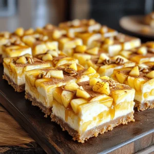 - 1 ½ cups graham cracker crumbs - ½ cup unsalted butter, melted - 2 tablespoons granulated sugar - 2 (8 oz) packages cream cheese, softened - 1 cup granulated sugar - 1 teaspoon vanilla extract - 2 large eggs - 2 cups apples, peeled and diced (such as Granny Smith or Honeycrisp) - 1 teaspoon cinnamon - ½ teaspoon nutmeg - 1 cup caramel sauce (store-bought or homemade) - ¼ cup chopped pecans (optional) To make caramel apple cheesecake bars, you need some tasty ingredients. First, graham cracker crumbs create a sturdy base. You mix these crumbs with melted butter and sugar. This forms a sweet crust that holds everything together. Next, cream cheese gives the bars a rich and smooth filling. Make sure the cream cheese is soft. This helps blend it well with sugar and eggs. The eggs keep the filling light and fluffy. Now, the stars of our bars are the apples. Granny Smith or Honeycrisp apples are best. They add a nice crunch and tartness. You can peel and dice them for easy mixing. Spices like cinnamon and nutmeg add warmth and flavor. They make the bars feel like fall. Finally, you can drizzle caramel sauce on top for that sweet finish. If you like, add chopped pecans for a crunchy bite. Gather these ingredients, and you are ready to start making your delicious dessert! 1. Preheat your oven to 350°F (175°C). Line a 9x13 inch baking pan with parchment paper. Leave some paper hanging over the edges for easy removal. 2. In a bowl, mix 1 ½ cups of graham cracker crumbs, ½ cup melted unsalted butter, and 2 tablespoons of sugar. Stir until it looks like wet sand. 3. Press the mixture evenly into the bottom of the pan to form the crust. Bake for 10 minutes, then let it cool slightly. 1. In a large bowl, beat 2 packages of softened cream cheese with an electric mixer until smooth. 2. Add 1 cup of granulated sugar and 1 teaspoon of vanilla extract. Mix well until combined. 3. Add 2 large eggs, one at a time. Mix on low speed until just combined. Don't overmix; this helps keep it creamy. 4. Gently fold in 2 cups of peeled and diced apples, 1 teaspoon of cinnamon, and ½ teaspoon of nutmeg. Make sure they are evenly spread throughout. 1. Pour the apple cheesecake filling over the baked crust. Spread it evenly with a spatula. 2. Drizzle 1 cup of caramel sauce over the top. Use a knife or toothpick to swirl it through the filling. 3. If you like, sprinkle ¼ cup of chopped pecans on top for added crunch. 1. Bake in the preheated oven for 35-40 minutes. The center should be set, and the edges will turn a light golden color. 2. After baking, let the cheesecake bars cool to room temperature. Then, refrigerate for at least 3 hours to set completely. 3. Once set, lift the bars from the pan using the parchment overhang. Slice them into squares and enjoy! To get the best texture for your cheesecake bars, avoid overmixing the filling. When you beat the cream cheese and sugar, mix just until smooth. Then, add the eggs one at a time. Keep the mixer on low. This helps keep the filling creamy and fluffy. When it’s time to cut your bars, use a sharp knife. Dip it in warm water for clean cuts. Wipe the knife after each slice. This way, you get neat squares that look great on a plate. For a twist on flavor, try substituting the apples. Fuji or Gala apples work well too. You can also add cranberries or raisins for a sweet touch. This gives your bars a fun mix of tastes. Consider adding toppings for extra flair. You can sprinkle chopped pecans on top. Or, drizzle more caramel sauce for a richer flavor. A pinch of sea salt can also elevate the taste. Experiment with what you like. This makes your dessert even more special! {{image_2}} You can switch up the apples in this recipe for fun. Try using Fuji or Gala apples for a sweeter taste. You could even add cranberries or raisins for a tart twist. This adds great flavor and texture to your bars. If you need a gluten-free option, use gluten-free graham cracker crumbs for the crust. You can also make these bars vegan. Replace cream cheese with a plant-based cream cheese. For eggs, use flaxseed meal mixed with water as a binder. These swaps keep the bars tasty and suitable for everyone. These cheesecake bars shine when paired with ice cream or whipped cream. A scoop of vanilla or a dollop of whipped cream brings out the flavors. For gatherings, serve the bars on a nice platter. Drizzle extra caramel sauce on top and sprinkle with cinnamon. Add a few apple slices for a beautiful finish. To keep your caramel apple cheesecake bars fresh, store them in an airtight container. Place a layer of parchment paper between the bars and the lid. This prevents sticking. Always refrigerate them if you plan to eat them within a few days. If you want to save some for later, you can freeze the bars. First, let them cool completely. Cut them into squares and wrap each piece tightly in plastic wrap. Then, place the wrapped bars in a freezer bag. Make sure to remove as much air as possible before sealing the bag. These bars will last about 5 days in the fridge. Look for any signs of spoilage, like a sour smell or discoloration. If you see these signs, it’s best to toss them. If frozen, they can last up to 3 months. When you’re ready to eat, just thaw them in the fridge overnight. Enjoy your tasty treat! Yes, you can use store-bought caramel sauce. It saves time and tastes great. If you want a fun twist, try making homemade caramel sauce. It’s simple and adds a personal touch. Just cook sugar, butter, and cream until smooth. Yes, you can make these bars ahead of time. Prepare them a day before your event. Just bake, cool, and refrigerate them. This way, they set well and flavors blend nicely. It also makes serving easy when you have guests. To get clean cuts, use a sharp knife. Dip the knife in hot water before cutting. Wipe it dry between slices. This helps keep the edges smooth. Another tip is to chill the bars before slicing. Cold bars cut much neater. If you have leftovers, store them in an airtight container. Keep them in the fridge for up to five days. You can also freeze them for later. Just wrap them tightly in plastic wrap and foil. Thaw in the fridge before serving again. This article covered how to make delicious caramel apple cheesecake bars from scratch. We discussed the key ingredients, like graham crackers and cream cheese, and provided step-by-step instructions for preparation and baking. I shared tips for perfecting texture, flavor enhancements, and storage ideas so you can enjoy these treats longer. Experiment with different fruits or dietary options to make them your own. With this guide, you can create a delightful dessert that's sure to impress! Enjoy your baking adventure!