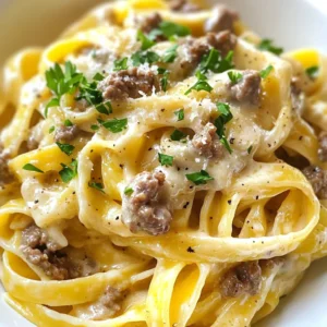 To make creamy beef pasta, you need: - 8 oz (225 g) fettuccine or your pasta of choice - 1 lb (450 g) ground beef - 1 medium onion, finely chopped - 3 cloves garlic, minced - 1 cup heavy cream - 1 cup beef broth - 1 cup grated Parmesan cheese - 1 tablespoon olive oil - 1 teaspoon Italian seasoning - Salt and fresh ground black pepper, to taste - Fresh parsley, chopped (for garnish) Gathering these ingredients sets you up for a tasty meal. Each item plays a key role. The beef adds protein, while cream gives it that rich taste. While I often use fettuccine for this dish, you can choose other pasta types too. Here are some great options: - Penne - Rotini - Linguine - Farfalle Pasta shapes like penne or rotini hold the sauce well. This makes every bite creamy and flavorful. To make your creamy beef pasta even better, consider these add-ins and garnishes: - Saut&eacute;ed mushrooms - Spinach or kale - Red pepper flakes for heat - Extra cheese on top These options let you customize your dish. You can add veggies or spice for more flavor. Garnishing with fresh parsley not only looks nice but adds freshness too! {{ingredient_image_1}} 1. First, bring a large pot of salted water to a boil. 2. Cook 8 oz of fettuccine until it is al dente. This takes about 8-10 minutes. 3. Drain the pasta and set it aside. 4. In a large skillet, heat 1 tablespoon of olive oil over medium heat. 5. Add 1 finely chopped onion to the skillet and cook for 2-3 minutes. 6. Next, add 1 lb of ground beef. Cook it until browned, about 5-7 minutes. 7. Break up the beef with a spoon as it cooks. Drain any excess fat if needed. 8. Now, add 3 minced garlic cloves and 1 teaspoon of Italian seasoning. Cook for 1 minute. 9. Pour in 1 cup of beef broth and stir. Let it simmer for 5 minutes on low heat. 10. Stir in 1 cup of heavy cream and 1 cup of grated Parmesan cheese. 11. Mix until the cheese melts and the sauce is smooth. 12. Add salt and fresh ground black pepper to taste. 13. Toss in the cooked pasta and coat it well with the creamy beef sauce. 14. Serve hot, garnished with fresh chopped parsley. - Always use plenty of water when boiling pasta. - Add salt to the water before cooking. This adds flavor. - Stir the pasta often to prevent sticking. - Check the package for cooking time. Start tasting a minute before the time is up. - Drain the pasta but do not rinse it. This helps sauce stick better. - Use a large skillet for more space. This helps with even cooking. - Brown the beef well to enhance the flavor. - Don&rsquo;t rush the simmering stage. This lets the flavors blend. - Stir the sauce often to prevent burning. - Adjust salt and pepper as needed for taste. When cooking ground beef, start with a hot skillet. This helps the beef brown well. Break the meat into small pieces as it cooks. This ensures even cooking. If there is too much fat, drain it before adding other ingredients. This keeps your dish lighter. To boost flavor, use fresh garlic and onion. They add depth to the dish. Italian seasoning brings warmth and herbal notes. Don&rsquo;t forget to taste your beef as you cook. Adjust salt and pepper to your liking. A little bit of spice can also heighten the flavor. For a smooth sauce, stir in the heavy cream slowly. Combine it with the beef broth first. This helps the flavors meld together. Grated Parmesan cheese adds richness and helps thicken the sauce. If the sauce is too thick, add a bit more broth. If it&rsquo;s too thin, simmer it longer. Pro Tips Cook Pasta Al Dente: Ensure your pasta is cooked al dente for the best texture. This will prevent it from becoming mushy when combined with the sauce. Use Fresh Garlic: Freshly minced garlic brings a brighter flavor compared to pre-minced options. It adds a lovely aroma and enhances the dish's overall taste. Adjust the Creaminess: If you prefer a lighter sauce, you can reduce the amount of heavy cream or substitute half-and-half for a less rich alternative. Garnish Generously: Don't skip the fresh parsley garnish! It adds a pop of color and a fresh flavor that balances the richness of the creamy sauce. {{image_2}} You can switch out ground beef for other proteins. Ground turkey works well for a lighter dish. Chicken breast, diced and cooked, also fits nicely. If you want a punch, try chorizo. It adds great spice and flavor. Each option brings a unique taste to the creamy sauce. For a vegetarian twist, use mushrooms instead of meat. Finely chop them and saut&eacute; until tender. You can also add lentils for protein. They cook quickly and absorb flavors well. Another good choice is plant-based meat. Many brands offer tasty options that mimic beef. Cheese can change the whole dish. Instead of Parmesan, try mozzarella for a gooey texture. Cheddar gives a sharp flavor that pairs nicely with beef. For a tangy twist, add goat cheese. It melts well and adds creaminess. Mix and match your favorites to find the best combo. Store your creamy beef pasta in an airtight container. Let it cool to room temperature first. This helps keep the pasta fresh. Place it in the fridge for up to three days. Make sure to label the container with the date. If you have a lot, consider dividing it into smaller portions. This makes it easy to grab a quick meal later. To reheat your creamy beef pasta, use the stove or microwave. If using the stove, add a splash of beef broth or cream to the pan. Heat on low, stirring often, until warm. If using the microwave, place it in a safe dish. Heat in short bursts, stirring in between. This keeps the pasta from drying out. You can freeze creamy beef pasta for up to three months. Use a freezer-safe container or bag. Remove as much air as you can to prevent freezer burn. When ready to eat, thaw it overnight in the fridge. Reheat as mentioned before. The pasta may be softer after freezing, but the flavor stays great! Yes, you can use any pasta you like. Fettuccine works well, but penne, rigatoni, or spaghetti are great options too. Just make sure to cook the pasta until al dente. This way, it holds its shape well in the creamy sauce. To add spice, try using red pepper flakes. Start with a pinch, then add more to taste. You can also use spicy Italian sausage instead of ground beef. Another option is to add diced jalape&ntilde;os or a dash of hot sauce to the beef mixture. This gives a nice kick without changing the dish too much. This creamy beef pasta goes well with many sides. A fresh green salad adds crunch and brightness. Garlic bread is a classic choice, perfect for soaking up sauce. Roasted vegetables like broccoli or asparagus also balance the richness of the dish. Try serving it with any of these for a complete meal. You learned about key ingredients and how to cook creamy beef pasta. I shared tips on perfecting the sauce and suggested variations for different diets. Remember to store your leftovers properly and reheat them for the best taste. This dish is easy to adapt, making it great for everyone. Enjoy cooking, and have fun exploring your own twists on this classic meal!
